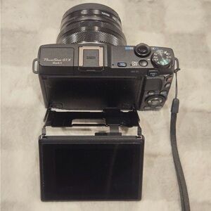 Canon Powershot G1X Mark II (step above
G7X and G9X), underwater case